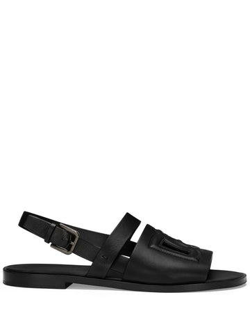 logo embossed leather slides