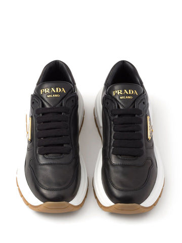 Triangle-logo leather sneakers