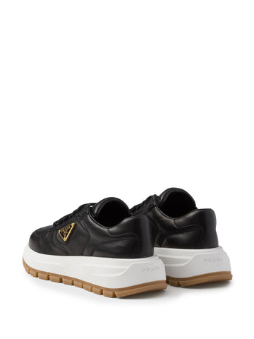 Triangle-logo leather sneakers