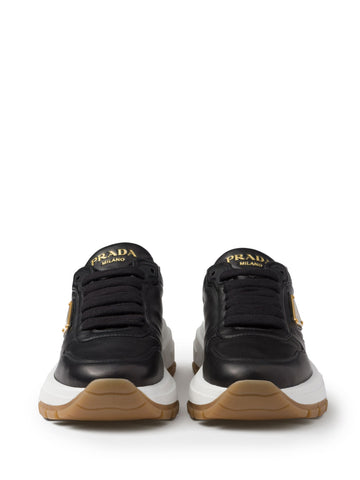 Triangle-logo leather sneakers