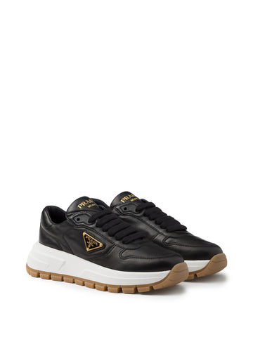 Triangle-logo leather sneakers