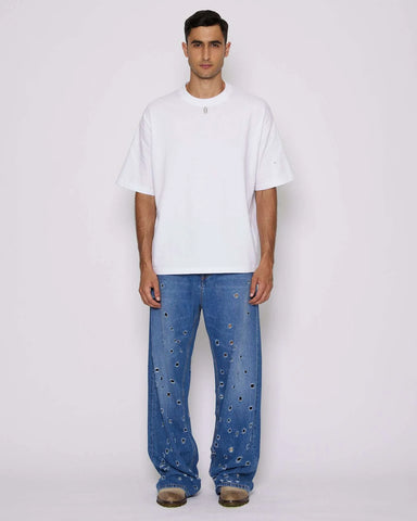 Wide leg jeans with metal holes on the front