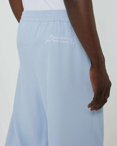 Pants with embroidered logo on the back