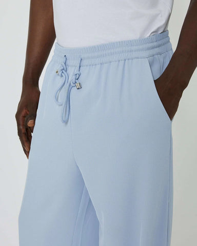Pants with embroidered logo on the back
